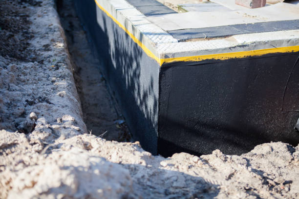 Professional Exterior Waterproofing technician working in Clayton, OH